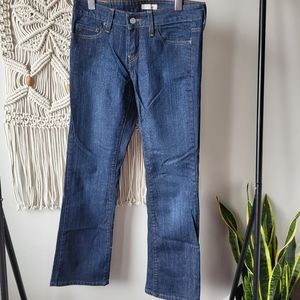 Levi's 545 women's dark wash low rise boot cut jeans. Size 4M